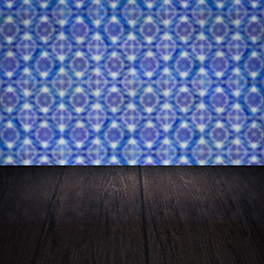 Image showing Wood table top and blur vintage ceramic tile pattern wall