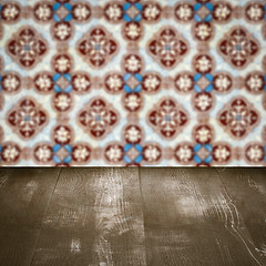 Image showing Wood table top and blur vintage ceramic tile pattern wall