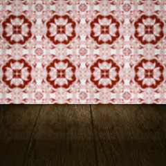 Image showing Wood table top and blur vintage ceramic tile pattern wall