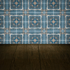 Image showing Wood table top and blur vintage ceramic tile pattern wall