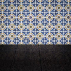 Image showing Wood table top and blur vintage ceramic tile pattern wall