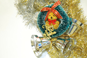 Image showing silver bells with teddy wreath and tinsel