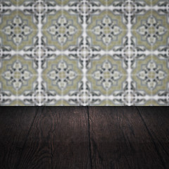 Image showing Wood table top and blur vintage ceramic tile pattern wall