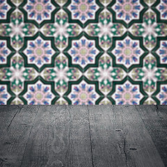 Image showing Wood table top and blur vintage ceramic tile pattern wall