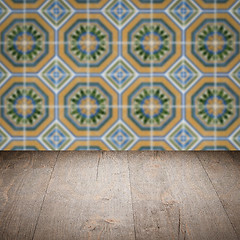 Image showing Wood table top and blur vintage ceramic tile pattern wall