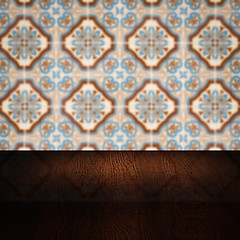 Image showing Wood table top and blur vintage ceramic tile pattern wall