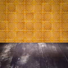 Image showing Wood table top and blur vintage ceramic tile pattern wall