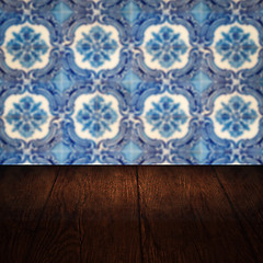 Image showing Wood table top and blur vintage ceramic tile pattern wall