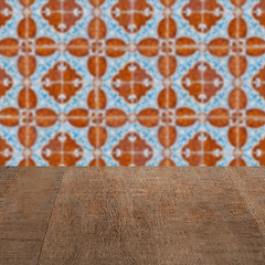 Image showing Wood table top and blur vintage ceramic tile pattern wall