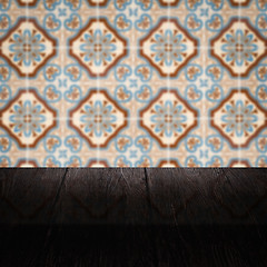 Image showing Wood table top and blur vintage ceramic tile pattern wall