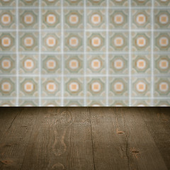 Image showing Wood table top and blur vintage ceramic tile pattern wall