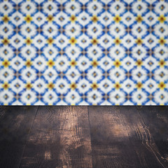 Image showing Wood table top and blur vintage ceramic tile pattern wall