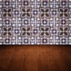 Image showing Wood table top and blur vintage ceramic tile pattern wall