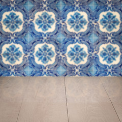 Image showing Wood table top and blur vintage ceramic tile pattern wall