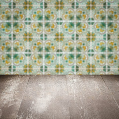 Image showing Wood table top and blur vintage ceramic tile pattern wall