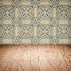 Image showing Wood table top and blur vintage ceramic tile pattern wall