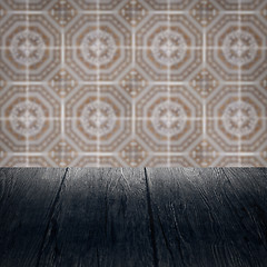 Image showing Wood table top and blur vintage ceramic tile pattern wall