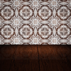 Image showing Wood table top and blur vintage ceramic tile pattern wall