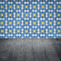 Image showing Wood table top and blur vintage ceramic tile pattern wall