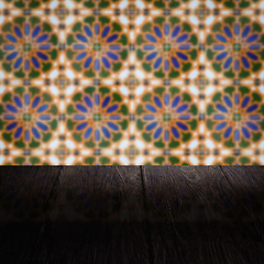 Image showing Wood table top and blur vintage ceramic tile pattern wall