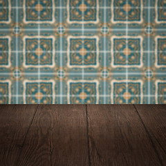 Image showing Wood table top and blur vintage ceramic tile pattern wall