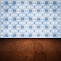 Image showing Wood table top and blur vintage ceramic tile pattern wall