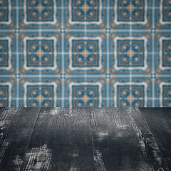 Image showing Wood table top and blur vintage ceramic tile pattern wall