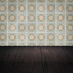 Image showing Wood table top and blur vintage ceramic tile pattern wall