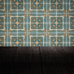 Image showing Wood table top and blur vintage ceramic tile pattern wall