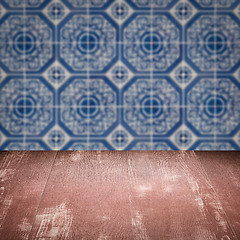 Image showing Wood table top and blur vintage ceramic tile pattern wall