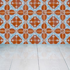 Image showing Wood table top and blur vintage ceramic tile pattern wall