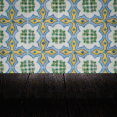 Image showing Wood table top and blur vintage ceramic tile pattern wall