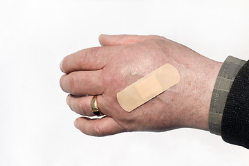 Image showing   hand man band-aid