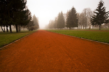 Image showing the red foot road 