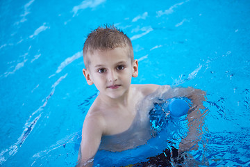 Image showing child on swimming poo