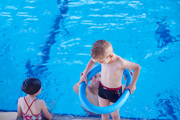 Image showing child on swimming poo