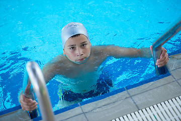 Image showing child on swimming poo