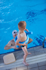 Image showing child on swimming poo