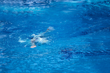 Image showing swimmer excercise on indoor swimming poo