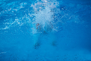 Image showing swimmer excercise on indoor swimming poo