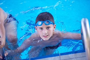 Image showing child on swimming poo