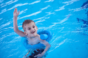 Image showing child on swimming poo