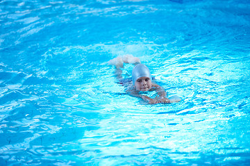 Image showing child on swimming poo