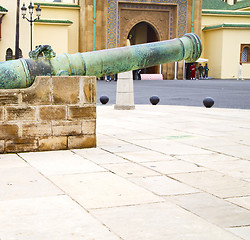 Image showing bronze cannon in africa morocco  green  and the old pavement