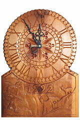 Image showing Clock carved on wood