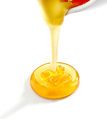 Image showing pouring honey