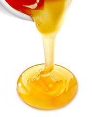 Image showing pouring honey