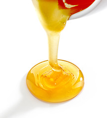 Image showing pouring honey