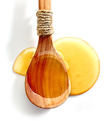 Image showing honey in a wooden spoon