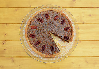 Image showing Pecan pie with a slice missing
